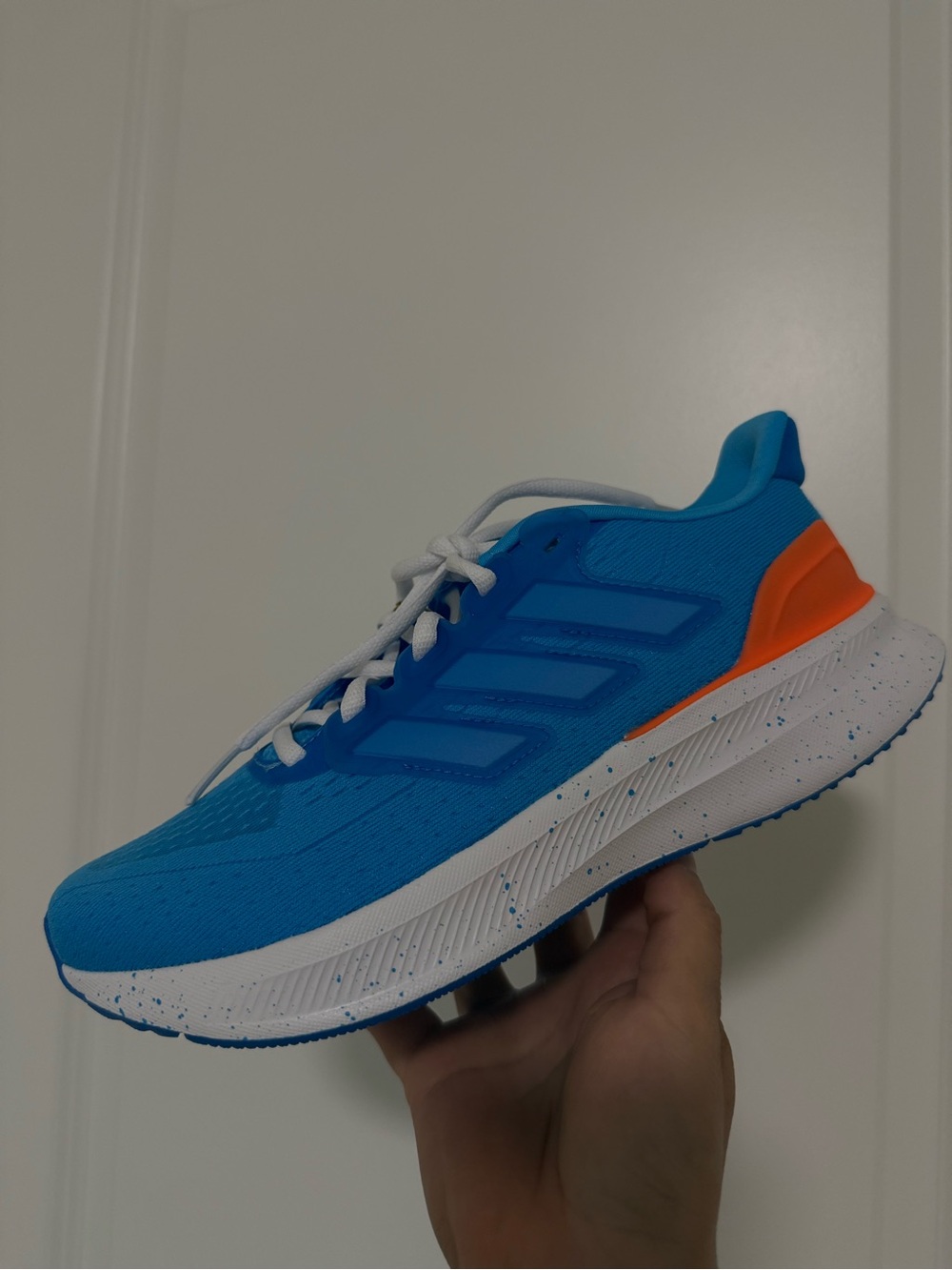 adidas Women’s Bright Blue Running Shoe with Orange Heel Accent